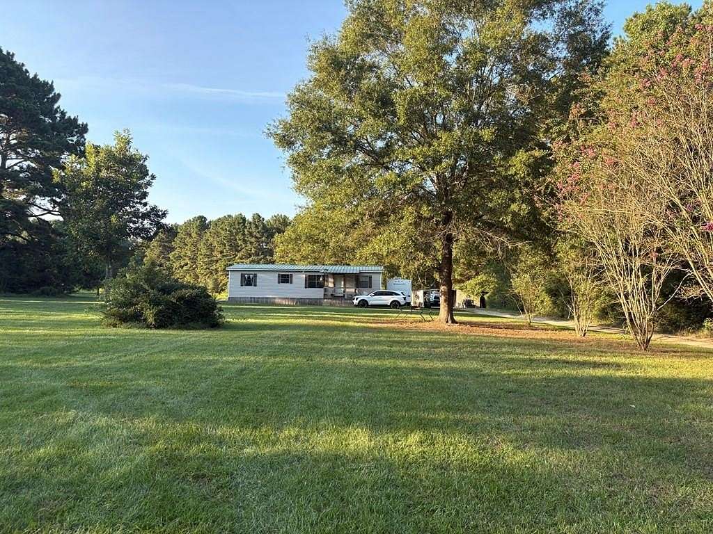 5 Acres of Land with Home for Sale in Huntington, Texas