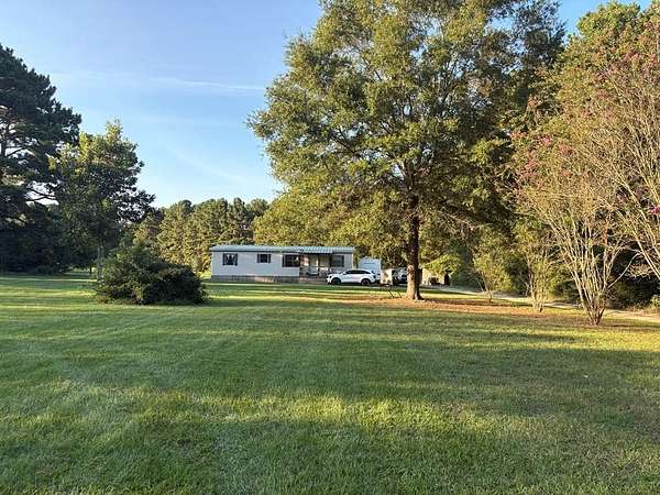 5 Acres of Residential Land with Home for Sale in Huntington, Texas