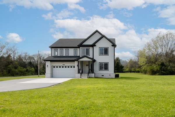 5.7 Acres of Land with Home for Sale in Mount Pleasant, Tennessee