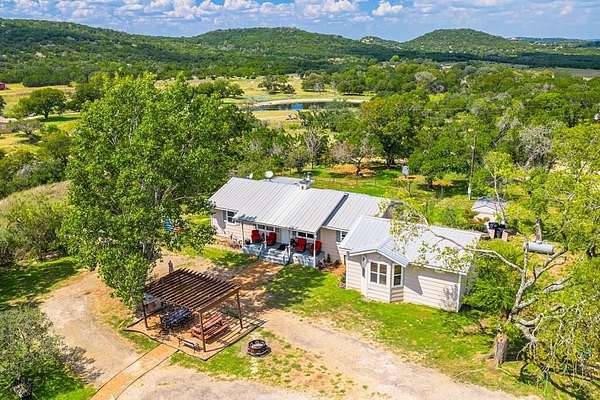 10.5 Acres of Land with Home for Sale in Center Point, Texas