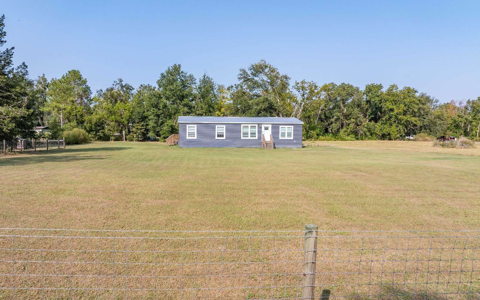 3 Acres of Residential Land with Home for Sale in Live Oak, Florida