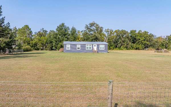 3 Acres of Residential Land with Home for Sale in Live Oak, Florida
