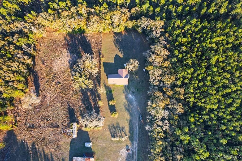 40 Acres of Agricultural Land with Home for Sale in Morriston, Florida