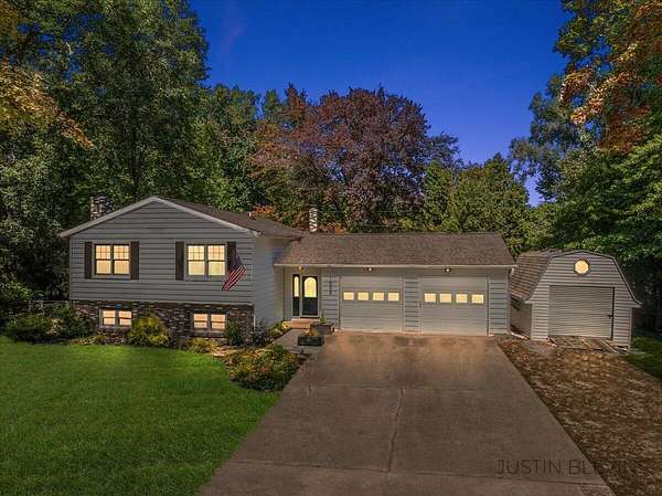 2.1 Acres of Residential Land with Home for Sale in Sparta, Michigan