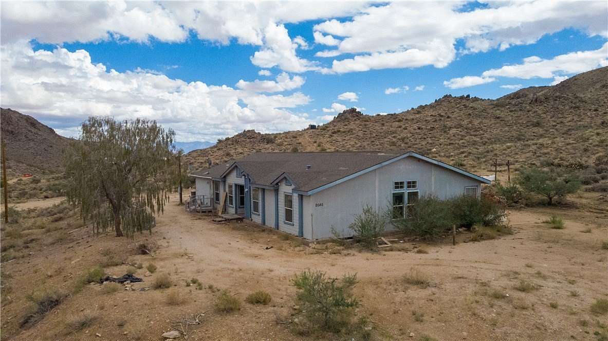 7.4 Acres of Residential Land with Home for Sale in Kingman, Arizona