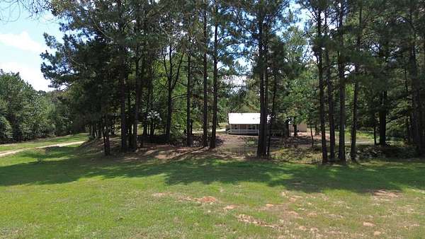 5 Acres of Land with Home for Sale in Crockett, Texas