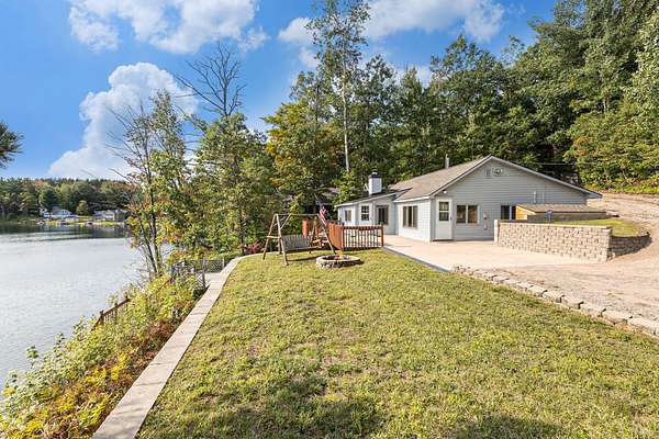 3 Acres of Residential Land with Home for Sale in Mancelona, Michigan