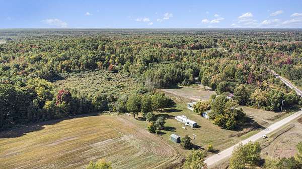 19.4 Acres of Land with Home for Sale in Harrison, Michigan