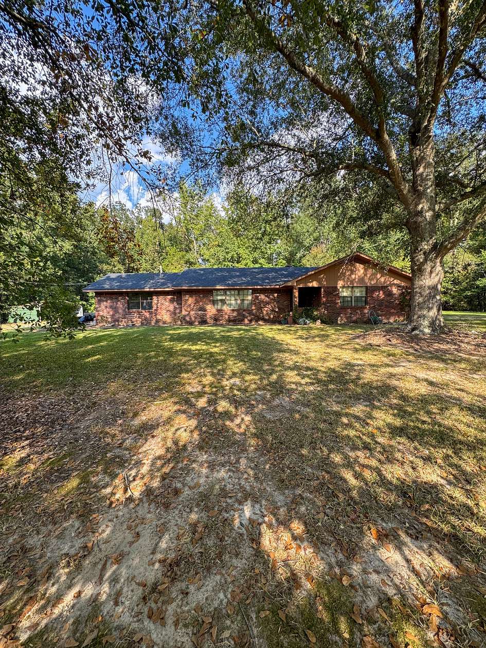 8 Acres of Residential Land with Home for Sale in Cedar Bluff, Mississippi