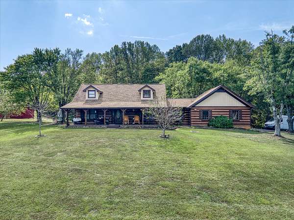 10.4 Acres of Land with Home for Sale in Moss, Tennessee