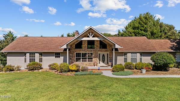 8.32 Acres of Land with Home for Sale in Sevierville, Tennessee