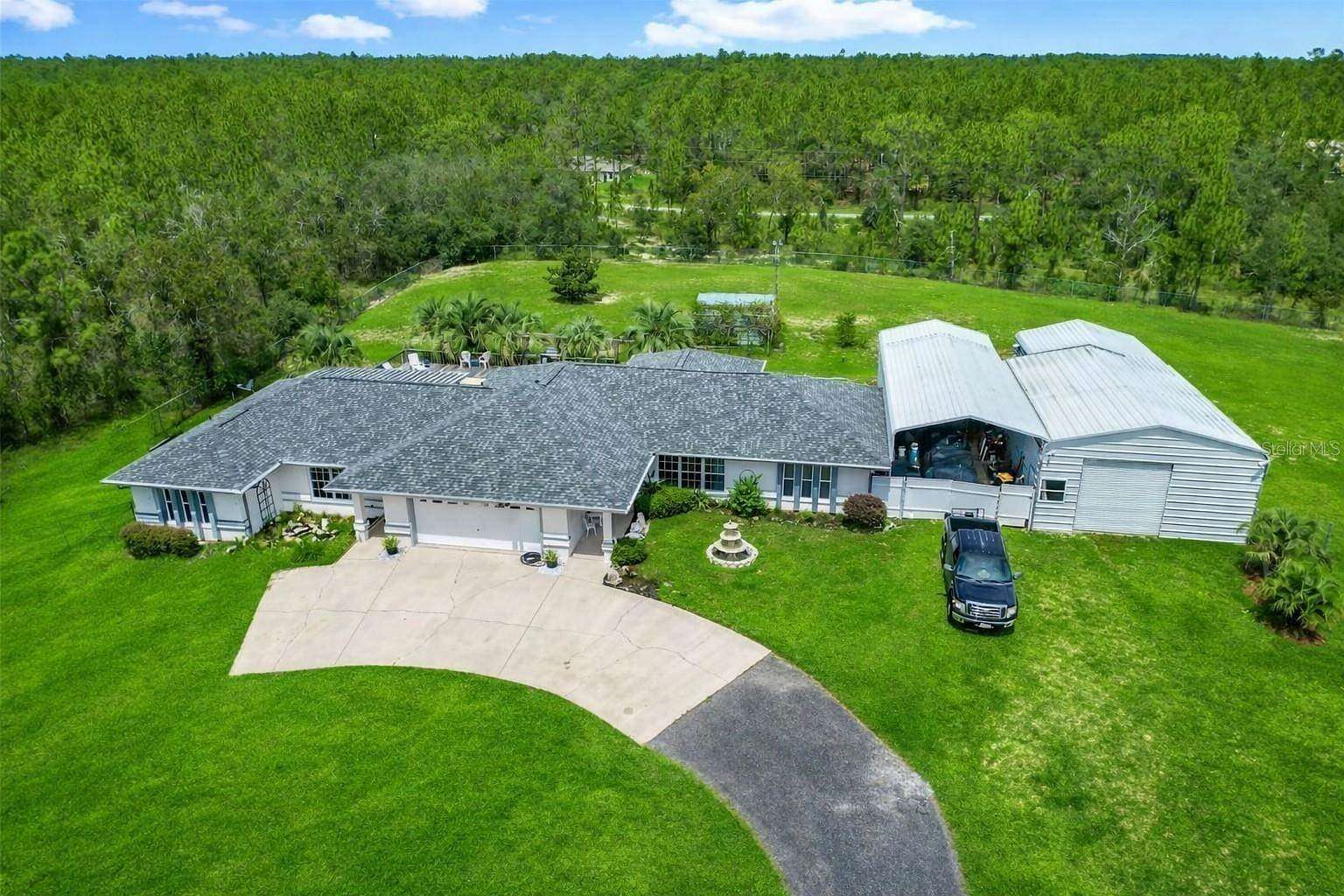 2.48 Acres of Land with Home for Sale in Dunnellon, Florida