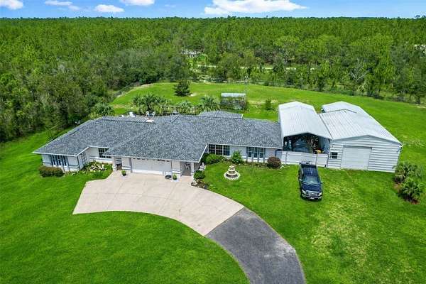 2.48 Acres of Residential Land with Home for Sale in Dunnellon, Florida