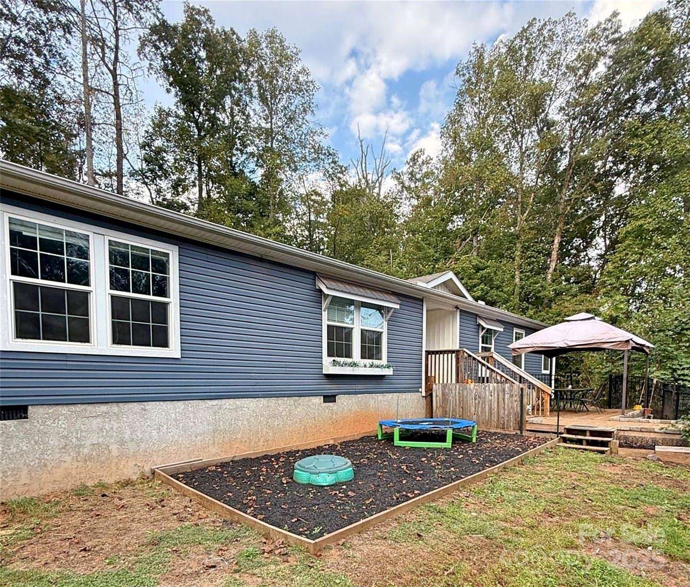 5 Acres of Residential Land with Home for Sale in Sylva, North Carolina