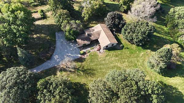 3 Acres of Residential Land with Home for Sale in Spencer, Iowa