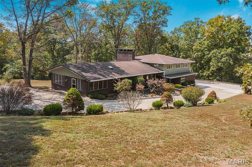 10.3 Acres of Land with Home for Sale in Marble Hill, Missouri