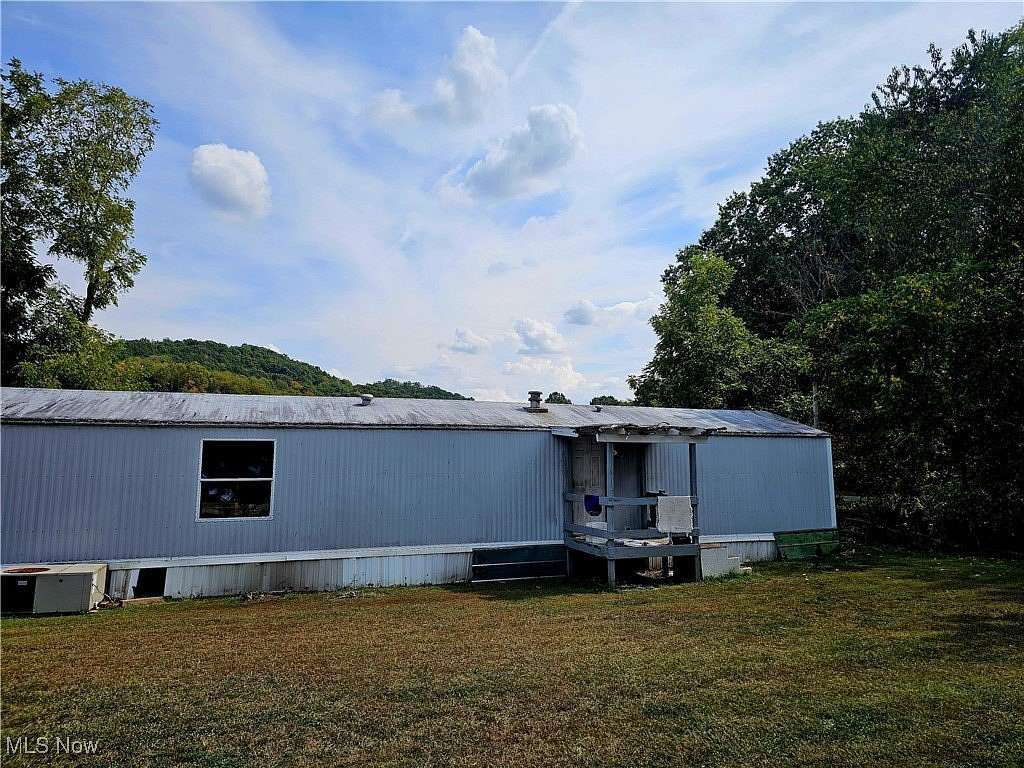 5.1 Acres of Residential Land with Home for Sale in Newcomerstown, Ohio