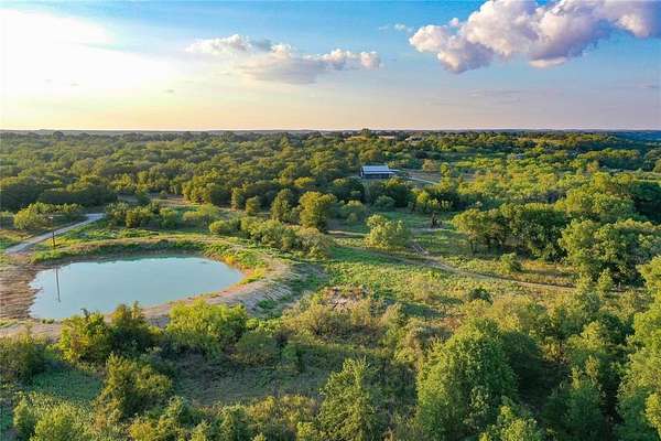 51.6 Acres of Land with Home for Sale in Perrin, Texas