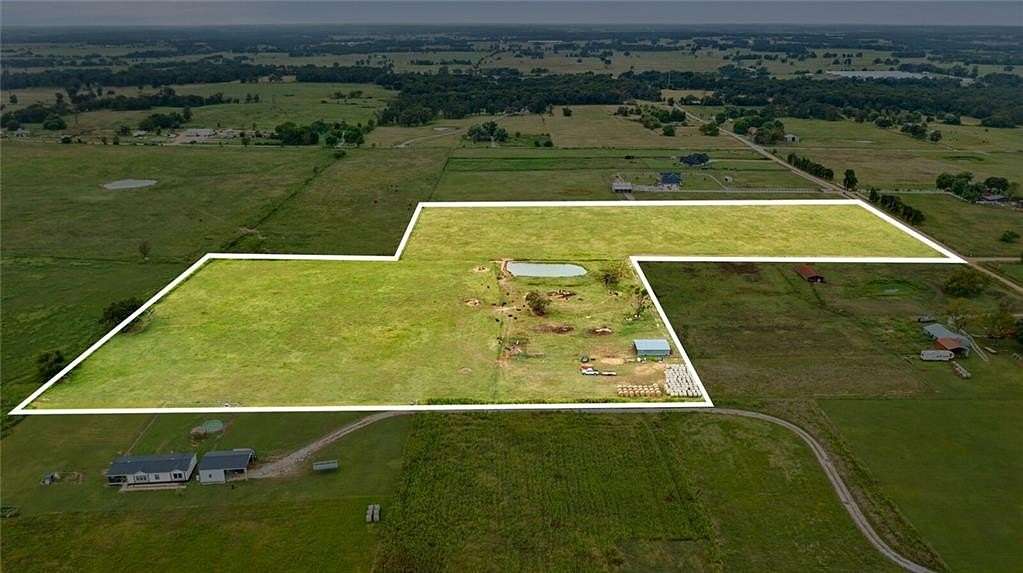 20 Acres of Agricultural Land for Sale in Gravette, Arkansas