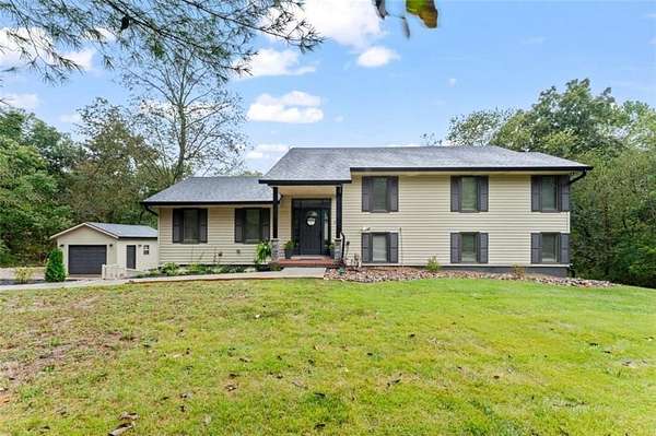 5 Acres of Residential Land with Home for Sale in Bates City, Missouri