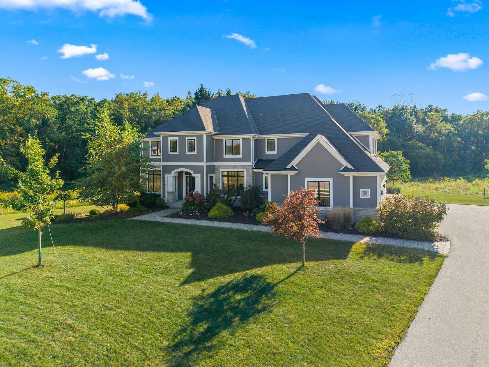 5.49 Acres of Residential Land with Home for Sale in Oconomowoc, Wisconsin