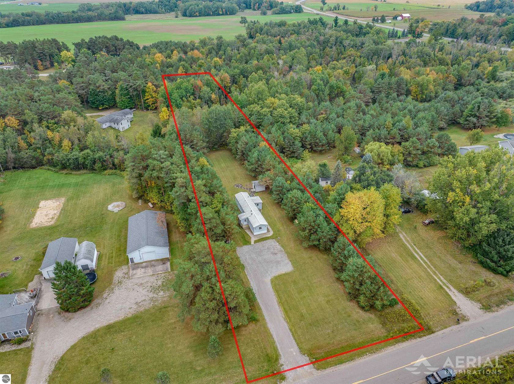2.1 Acres of Residential Land with Home for Sale in Rose City, Michigan