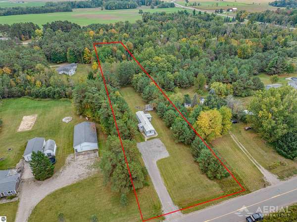 2.1 Acres of Residential Land with Home for Sale in Rose City, Michigan