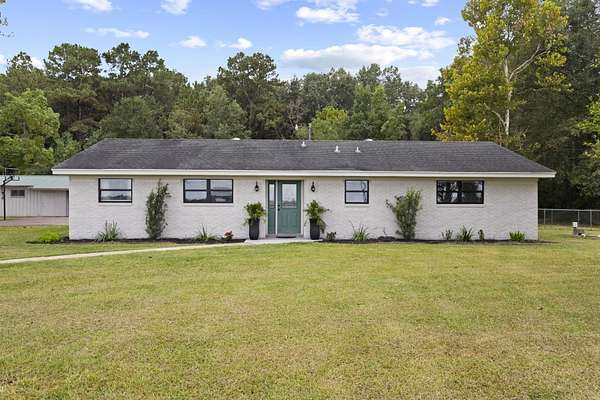 3 Acres of Residential Land with Home for Sale in Sour Lake, Texas