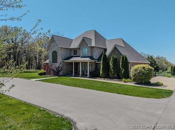 7.84 Acres of Residential Land with Home for Sale in Lebanon, Missouri