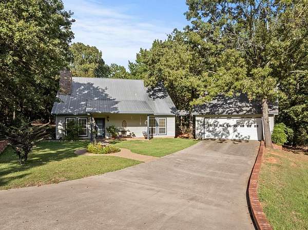 2.75 Acres of Land with Home for Sale in Scroggins, Texas