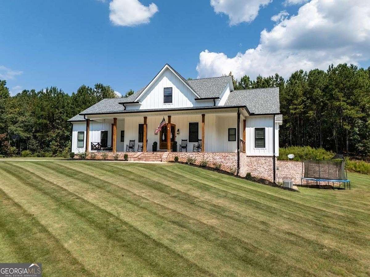 5 Acres of Residential Land with Home for Sale in Heflin, Alabama