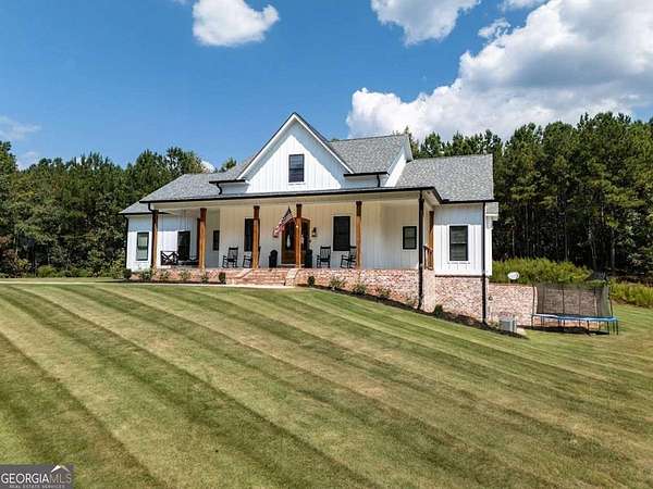 5 Acres of Residential Land with Home for Sale in Heflin, Alabama