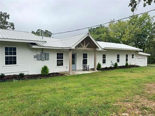 6.42 Acres of Residential Land with Home for Sale in Tahlequah, Oklahoma