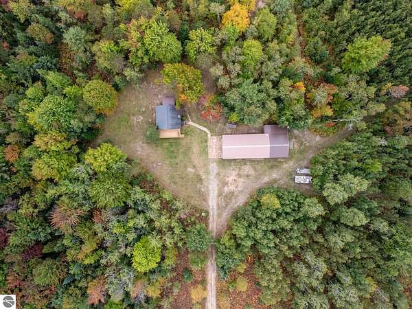 26.6 Acres of Recreational Land with Home for Sale in Kalkaska, Michigan
