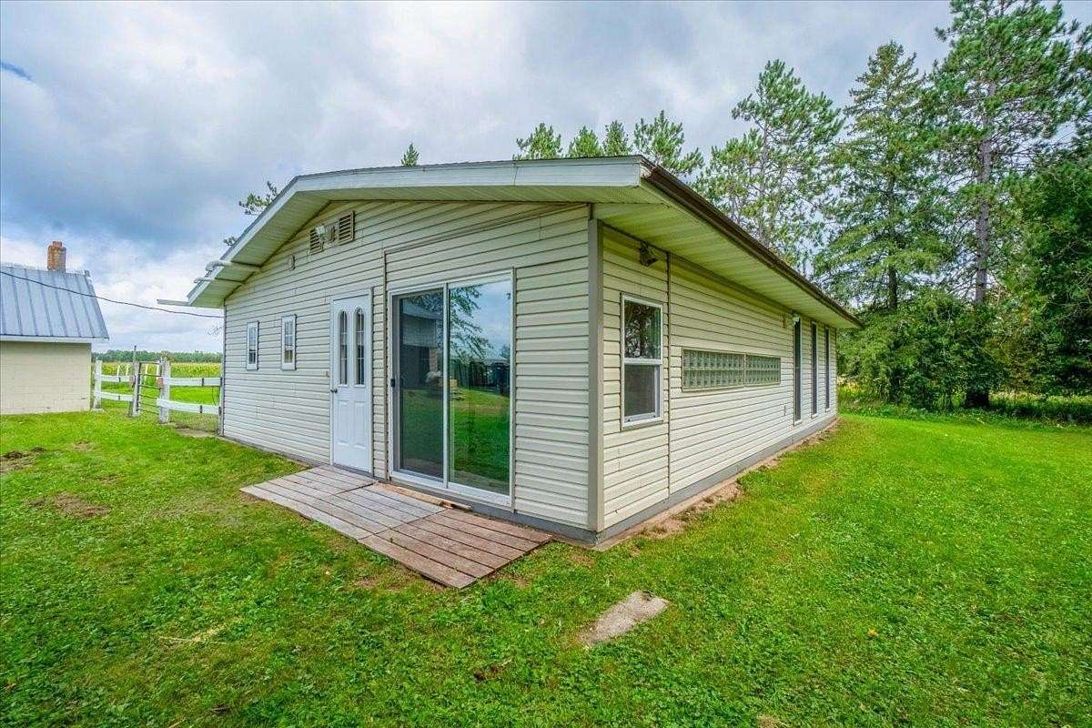 14.1 Acres of Land with Home for Sale in Holcombe, Wisconsin
