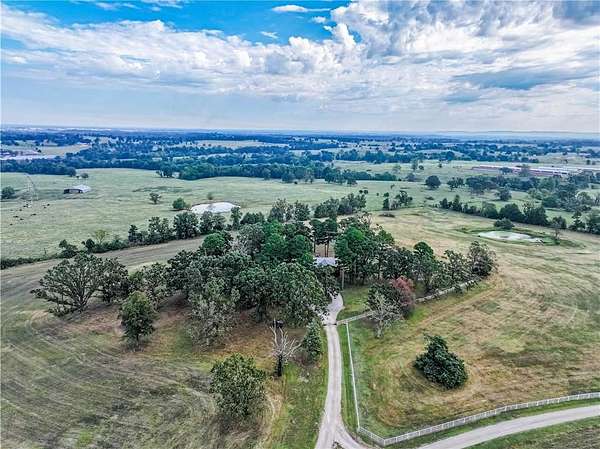 36 Acres of Agricultural Land with Home for Sale in Green Forest, Arkansas