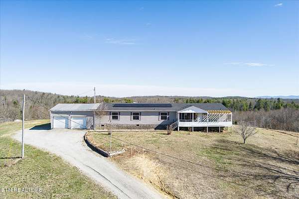 7 Acres of Land with Home for Sale in Deer Lodge, Tennessee