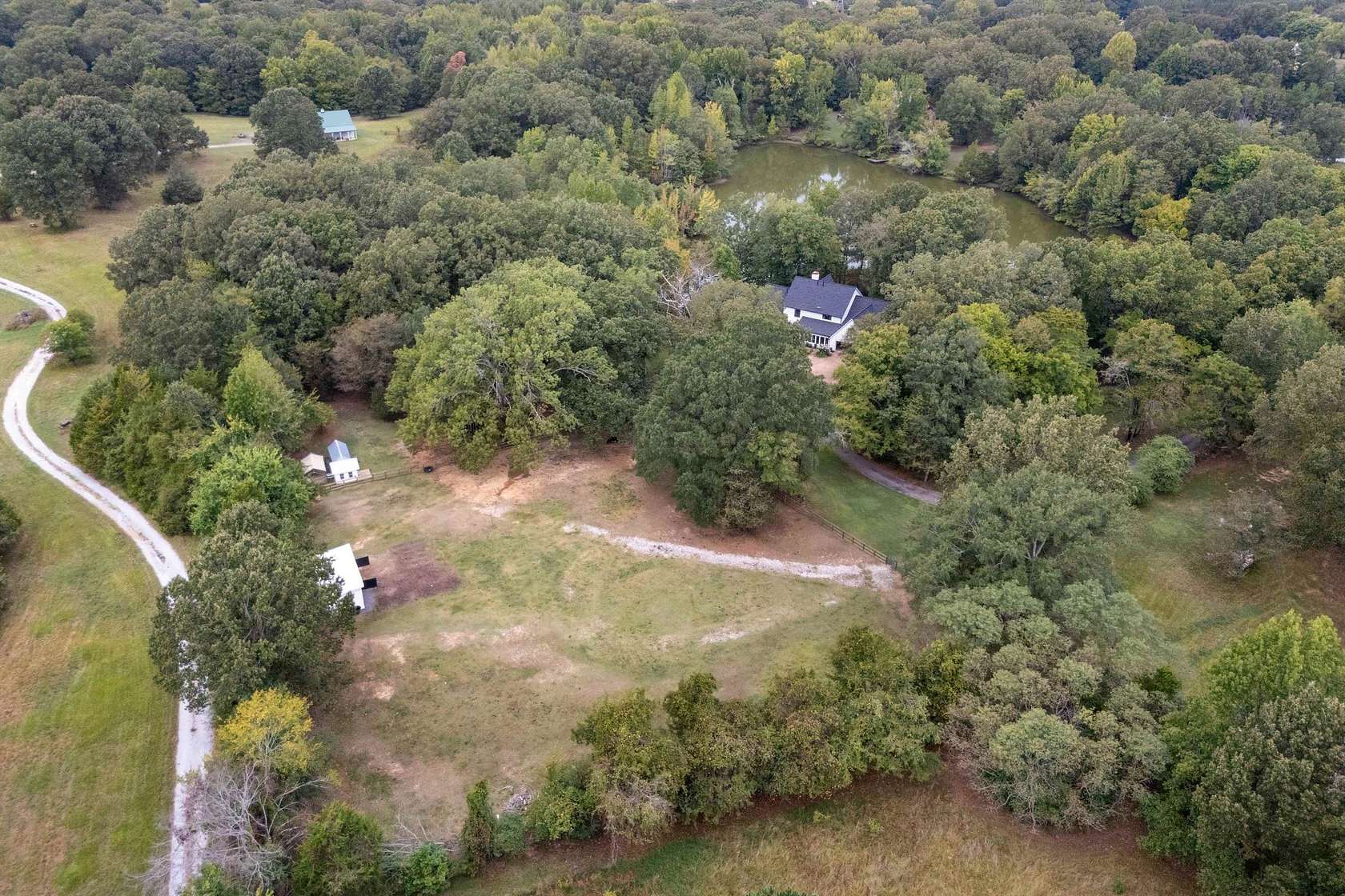 9.77 Acres of Residential Land with Home for Sale in Eads, Tennessee