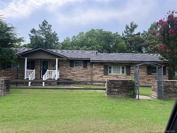 6.66 Acres of Residential Land with Home for Sale in Stigler, Oklahoma