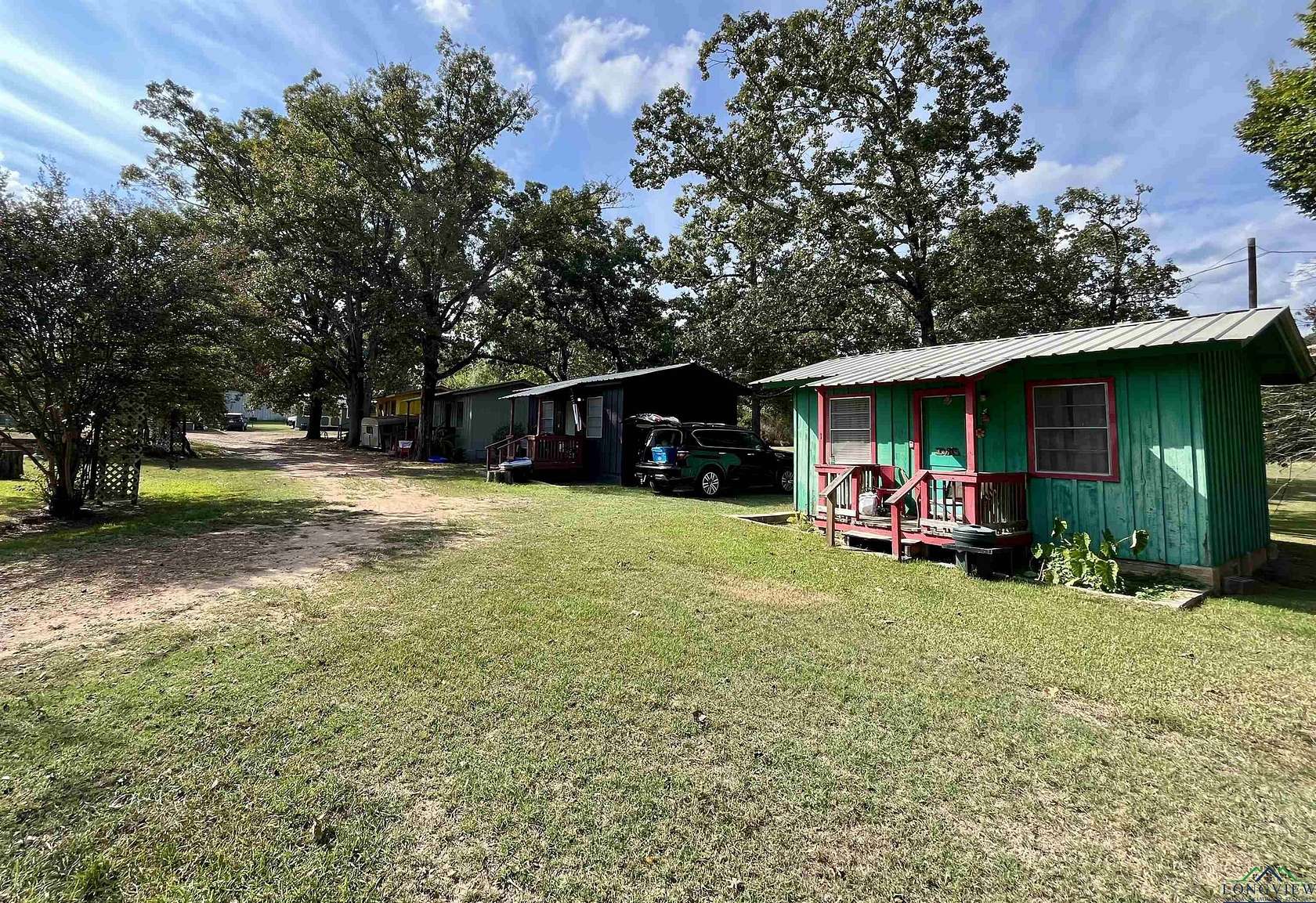 3.84 Acres of Residential Land with Home for Sale in Avinger, Texas