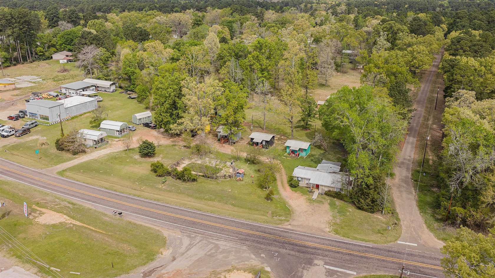 3.84 Acres of Land with Home for Sale in Avinger, Texas