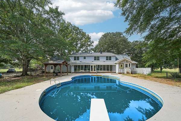 12.4 Acres of Land with Home for Sale in Locust Grove, Georgia