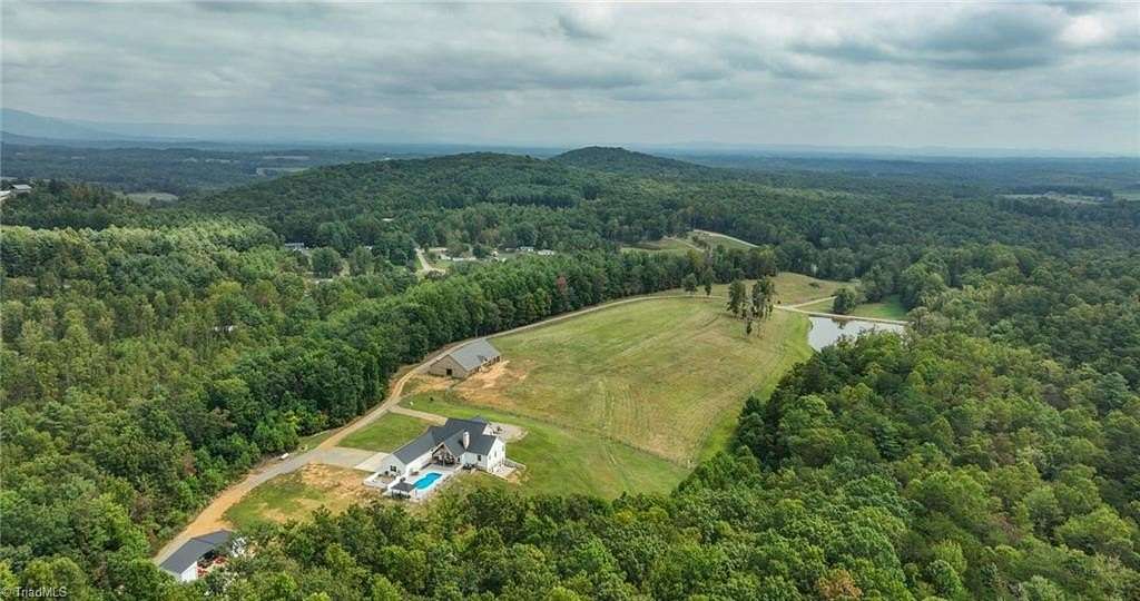 36 Acres of Land with Home for Sale in Lowgap, North Carolina