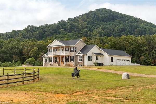 36 Acres of Land with Home for Sale in Lowgap, North Carolina