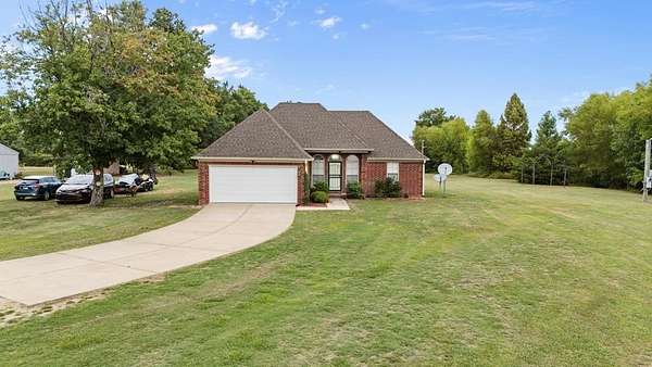 7.6 Acres of Land with Home for Sale in Proctor, Arkansas