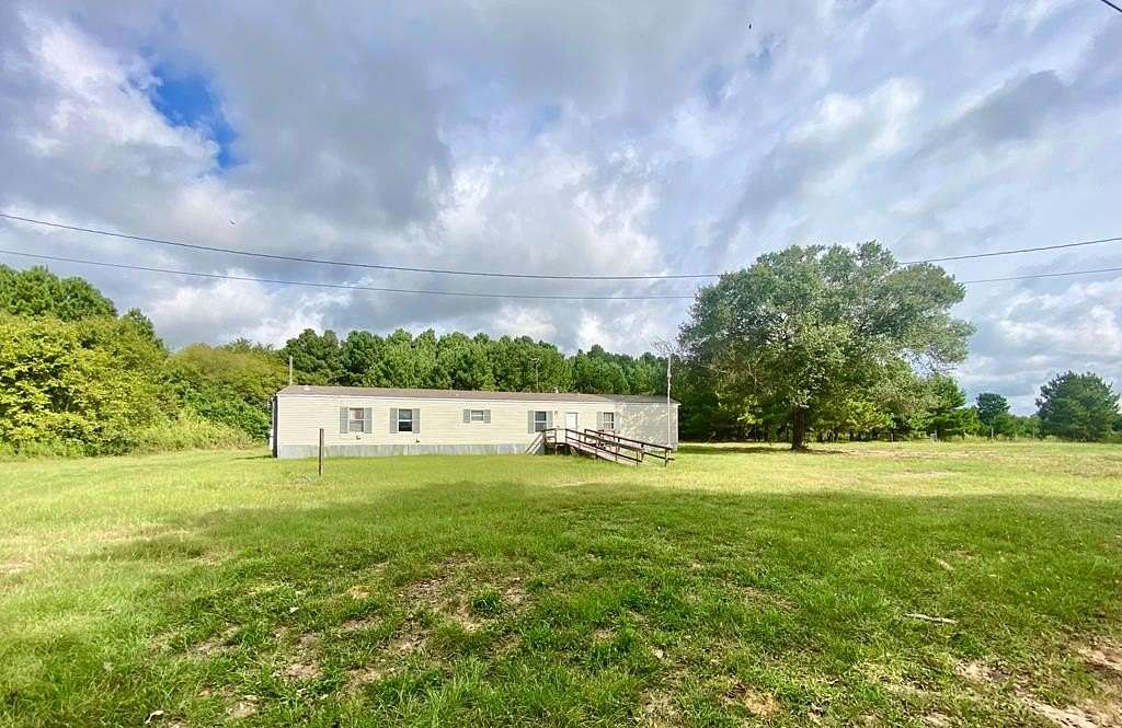 5 Acres of Residential Land with Home for Sale in Grapeland, Texas