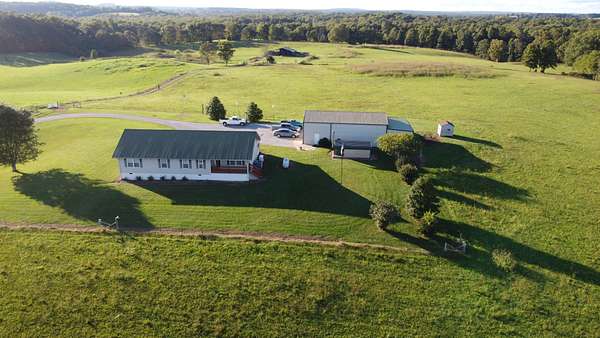 66 Acres of Recreational Land with Home for Sale in Pikeville, Tennessee