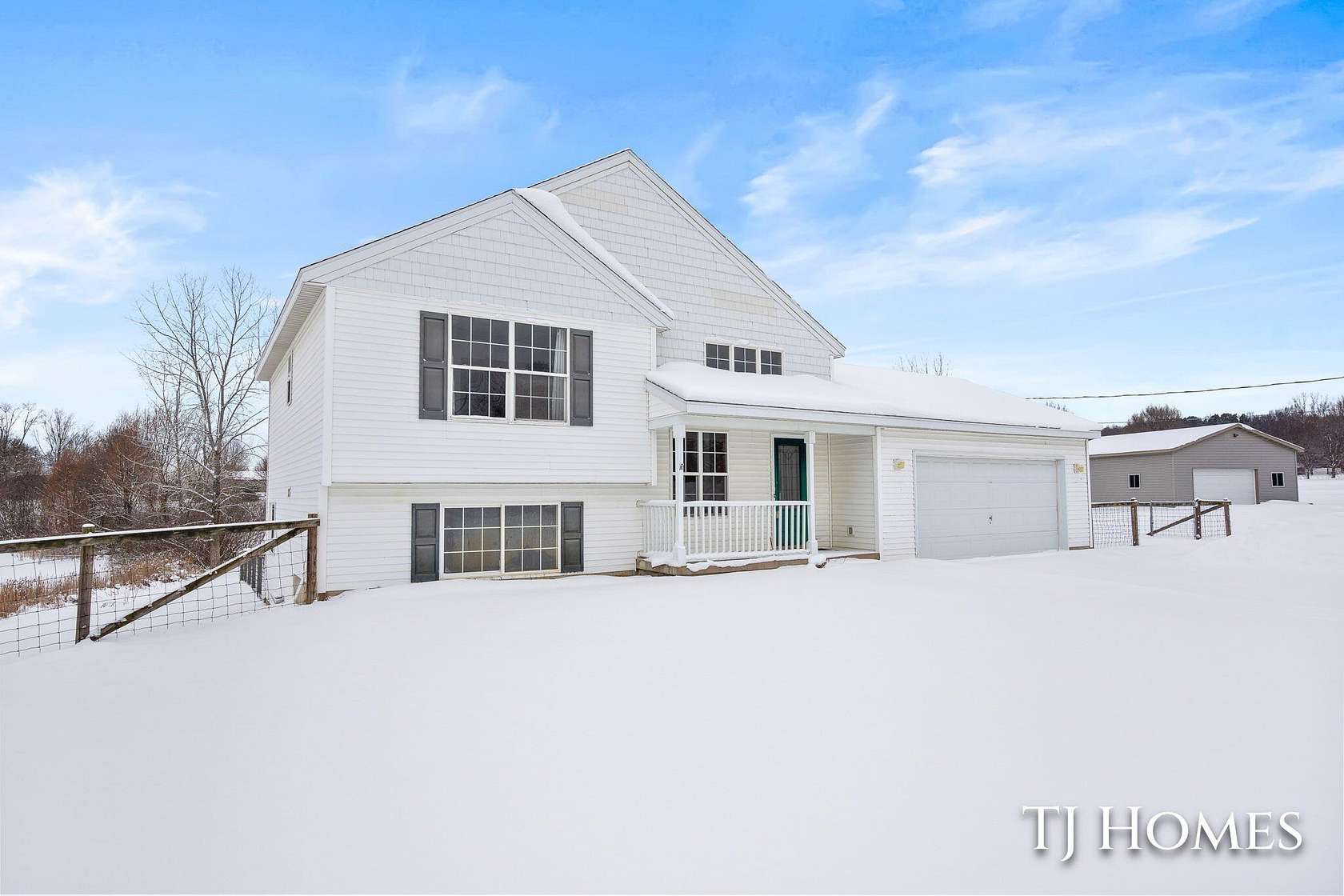 1.59 Acres of Land with Home for Sale in Rockford, Michigan