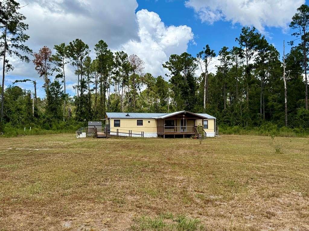 5 Acres of Residential Land with Home for Sale in Lake City, Florida