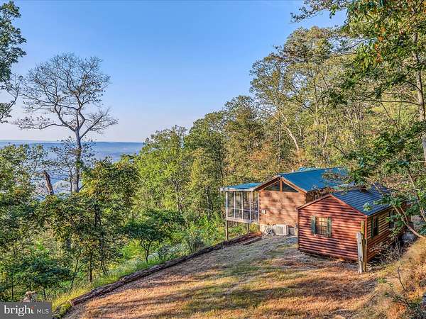 5.32 Acres of Residential Land with Home for Sale in Great Cacapon, West Virginia